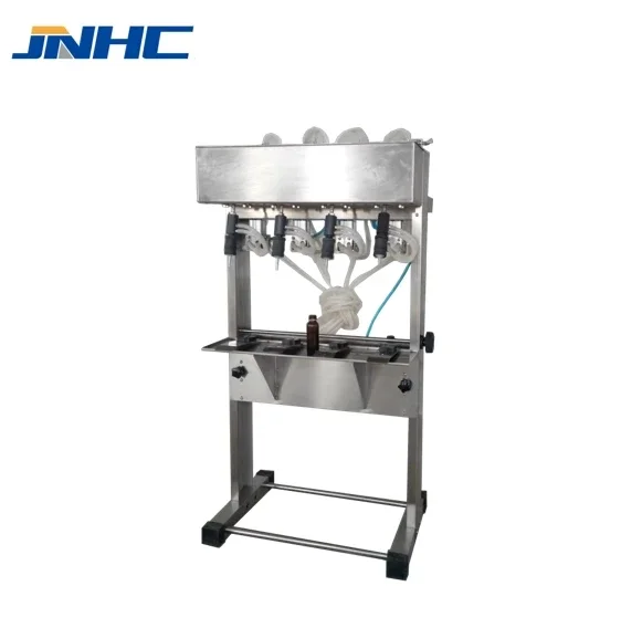 

Semi Automatic Pneumatic Four-heads Small Liquid Essential Oil Bottle Filler Liquid Perfume Filling Machine