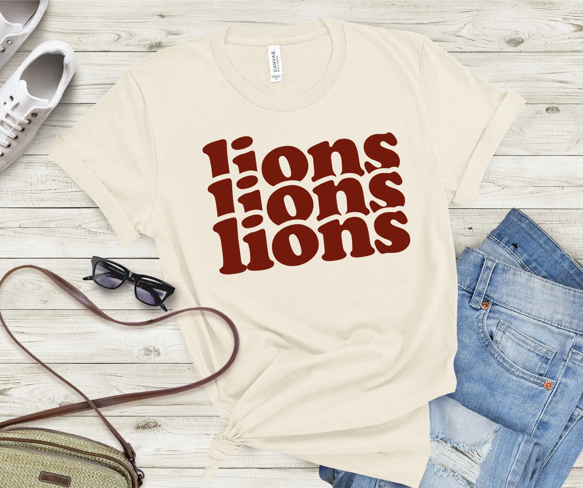 Roar with Pride Embrace the Retro 'Lions' T Shirt Perfect for Team and School Supporters