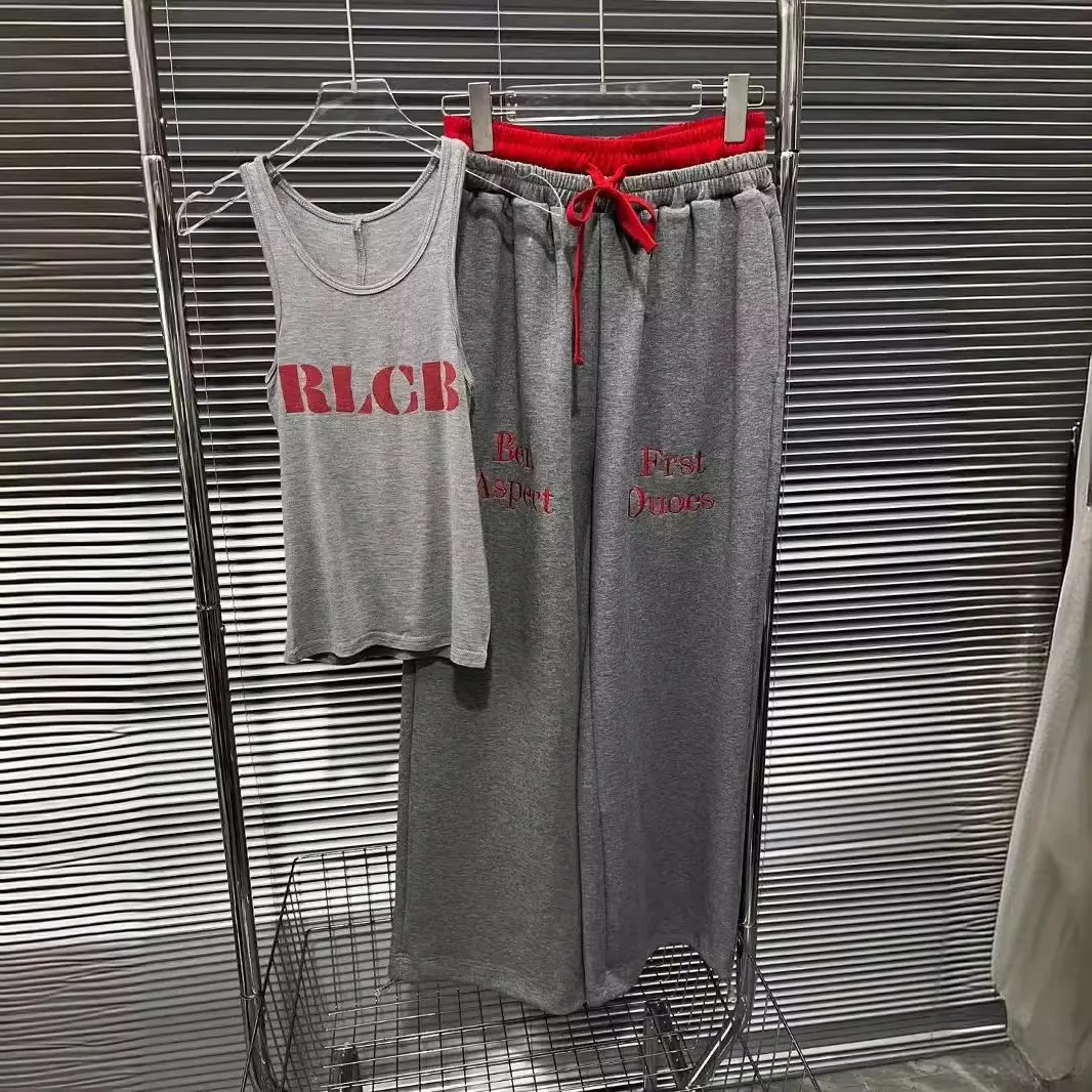 

sports department woman pull cool contrasting color double waist splicing sports trousers + printed shorts suspender vest