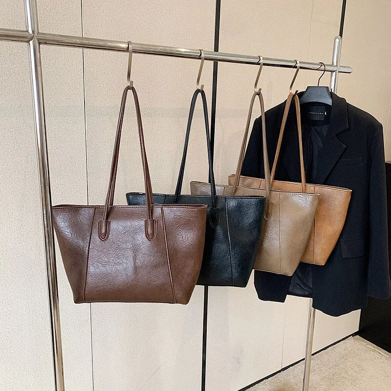 Bolsos de hombro de gran capacidad de PU sólido para mujer, bolsos de mano Clásicos informales, Totalizador versátil de alta calidad, gran oferta, 2024