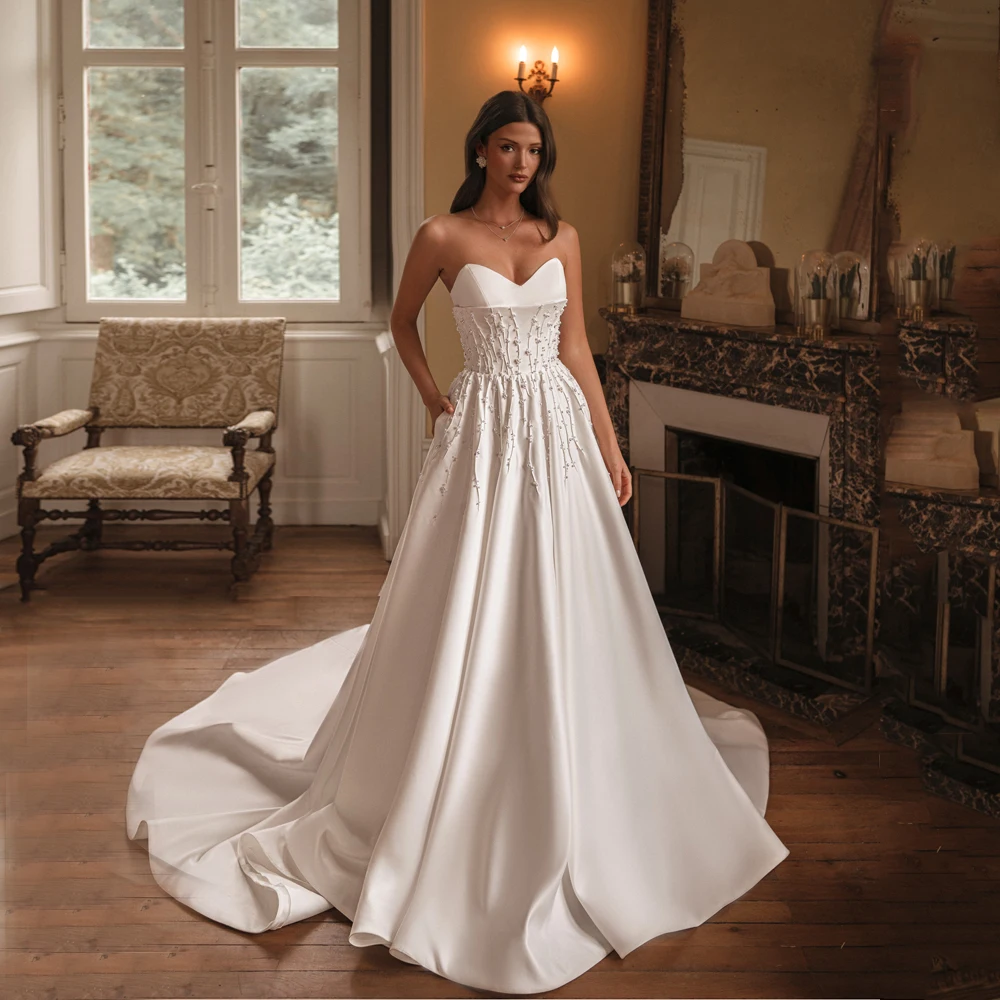 

Customized Satin A-Line Wedding Dress 2025 Bridal Beaded Strapless Elegant Bride Gowns With Pocket vestido de noiva Customized