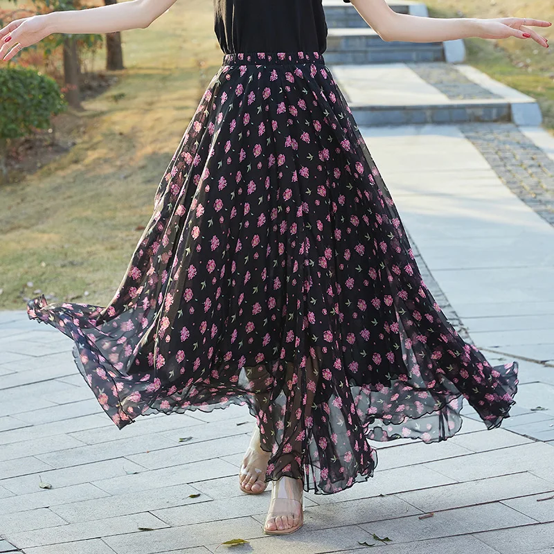 تنورة نصفية كاجوال مطبوعة بالزهور للنساء صيفية بنمط جديد لقضاء عطلة الشاطئ تنورة طويلة متأرجحة كبيرة بطول منتصف الساق لموسم ا...