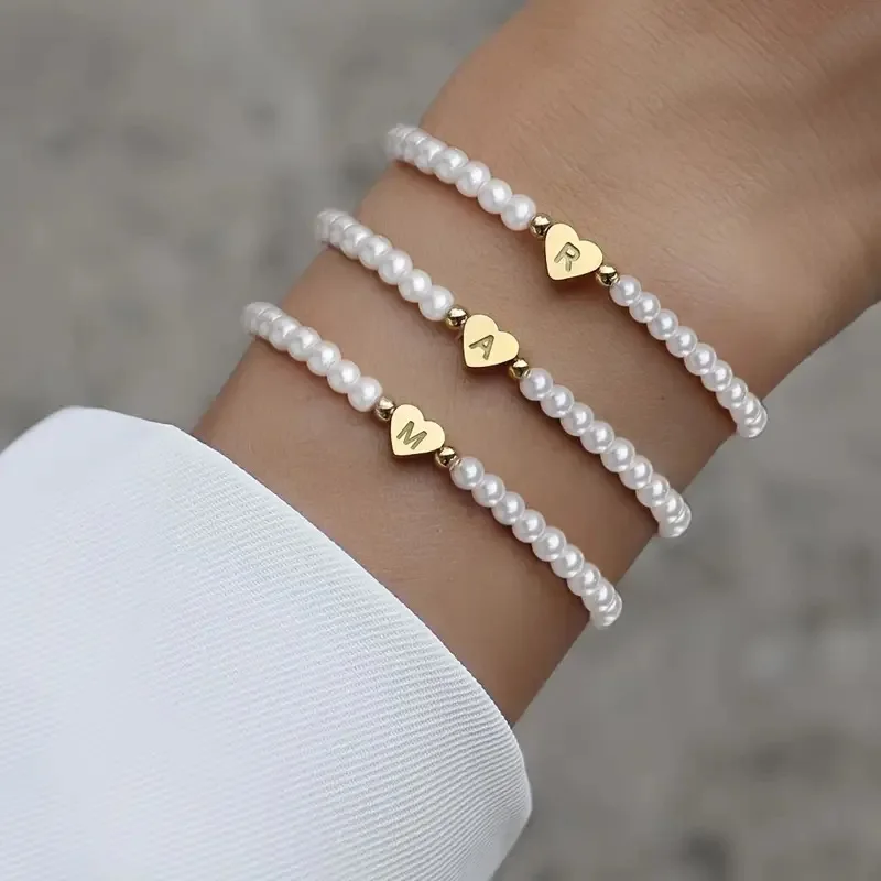 

2025 New French Retro Elegant Pearl 26 Letter Bracelet Light Luxury Fashion Women's Temperament Jewelry Gift Wholesale