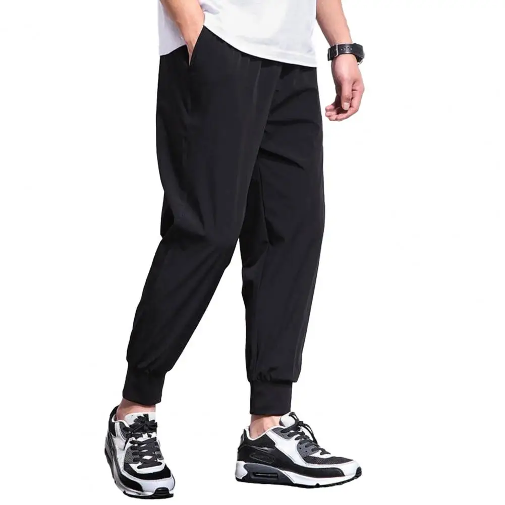 Calça esportiva respirável masculina com bolso lateral, calça confortável, design versátil, estilo de vida ativo