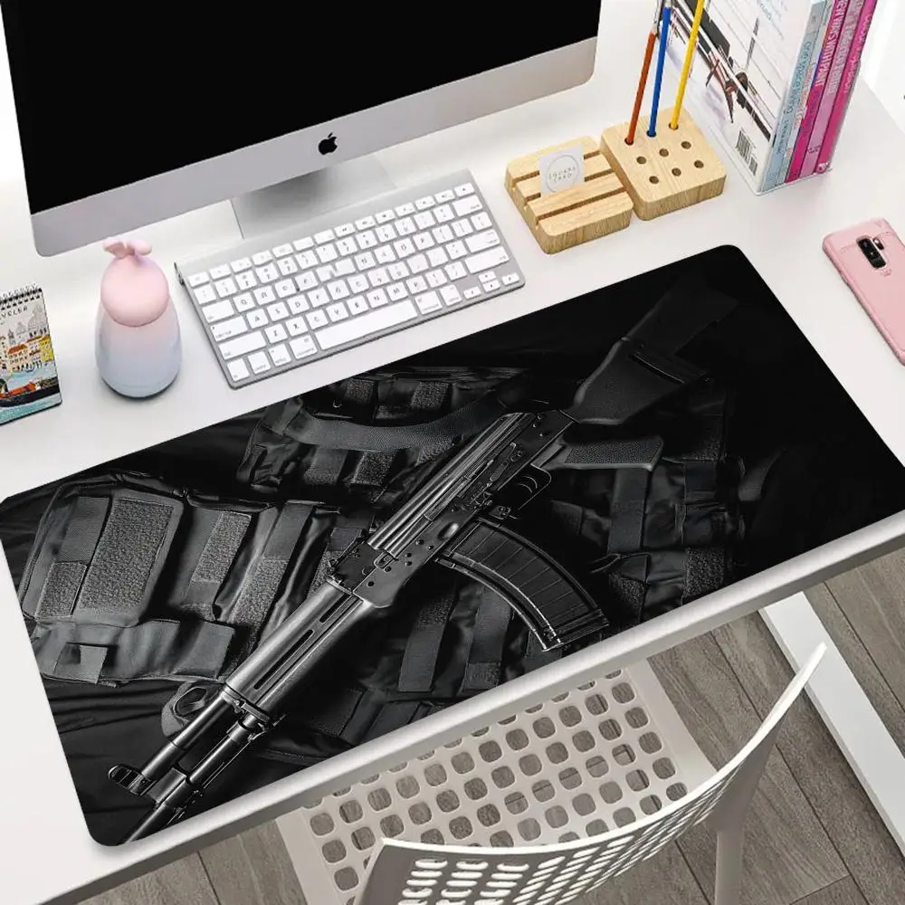 

A black mousepad with gun patterns Computer Gaming Accessories Desktop Mouse Endless Gamer Office Accessories Computer Large