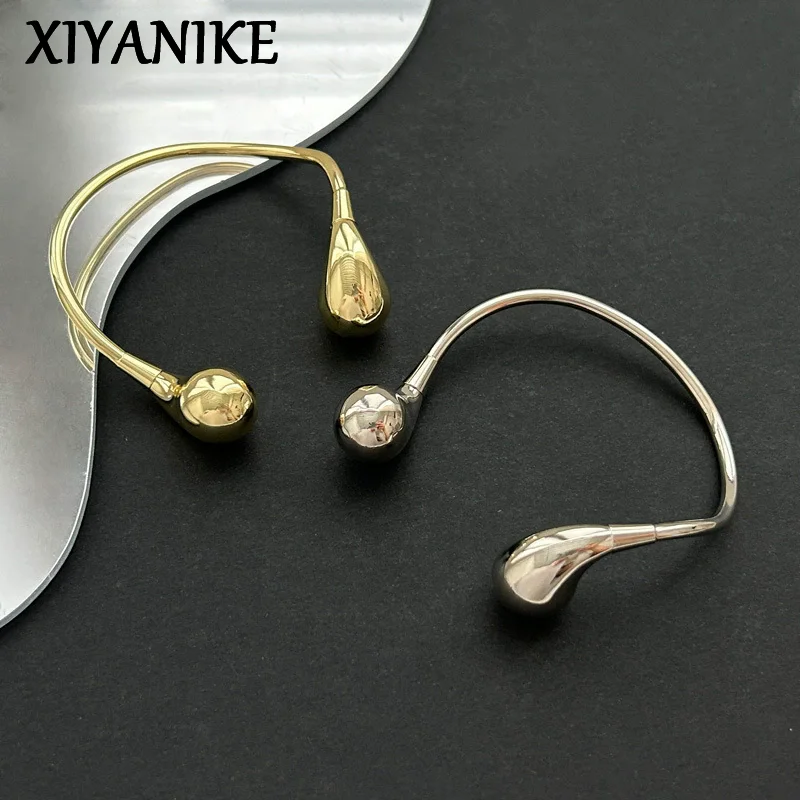 

XIYANIKE Asymmetrical Ball Waterdrop Cuff Bracelet For Women Girl Fashion New Jewelry Gift Party Music Festival
