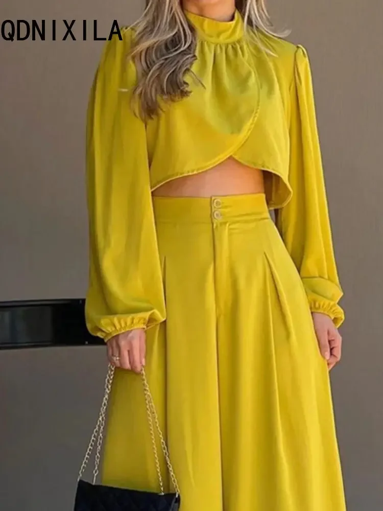 Nuovo Set di due pezzi moda estiva elegante Top irregolare vita alta gamba larga pantalone Set manica lunga giallo Sexy Top coordinati