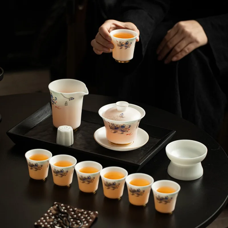 Light luxury ice kind soothing suet jade porcelain kung fu tea set, a complete set of gift box sets
