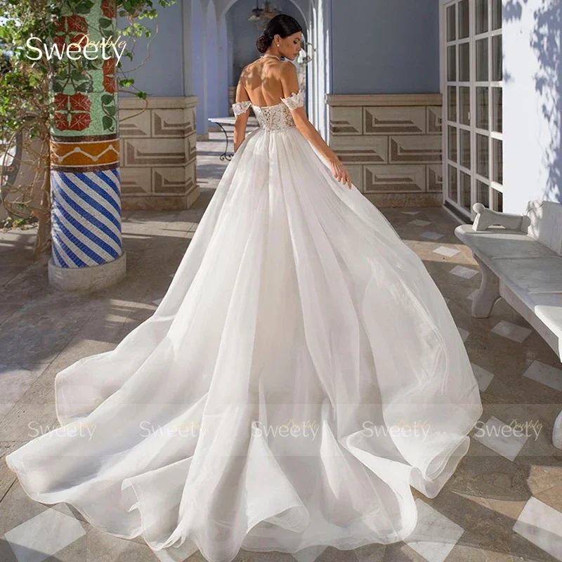 Abito da sposa con strascico staccabile a sirena in organza con ricamo abito da ballo con scollo a barca senza maniche con lacci Robe De Mariee personalizzato