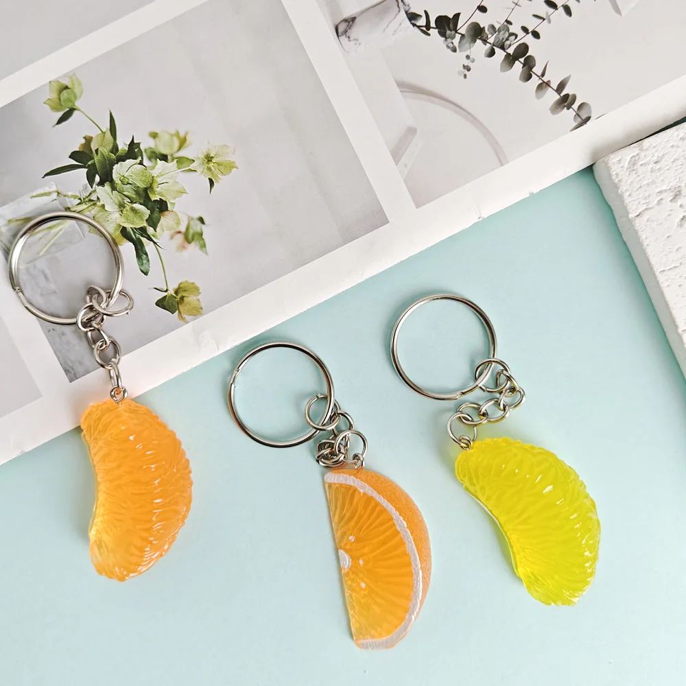 Personality creative simulation orange slice key chain sweet and lovely fruit car remote control key chain female bag pendant