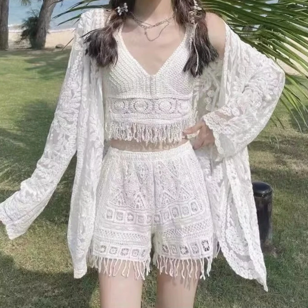 

2026 New Women's Clothing Beach Vacation Lace Long Sleeved Sun Protection Suit Cardigan Jacket Tank Top Shorts Three Piece Sets