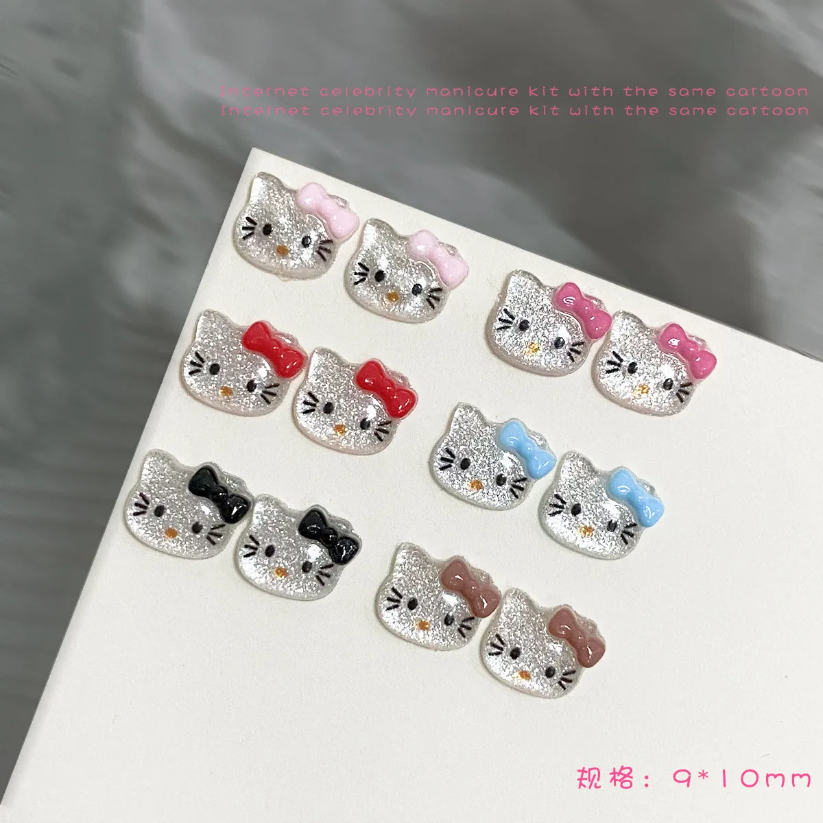 12 Siatek 3D Letnie Kokardki Hello Kitty Ozdoby do Paznokci Różowe/Czerwone/Niebieskie/Czarne/Brązowe Lodowe Przezroczyste Akcesoria do Paznokci z Kocimi Uszkami Artykuły do Zdobienia Paznokci