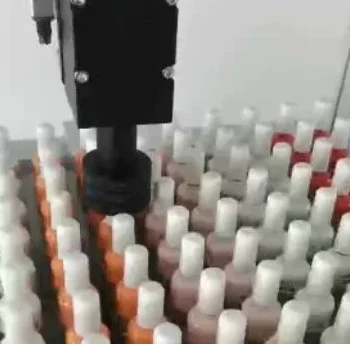 XYZ three-axis semi-automatic production cap-posing machine for nail polish bottles, water and lotion cap-posing production line
