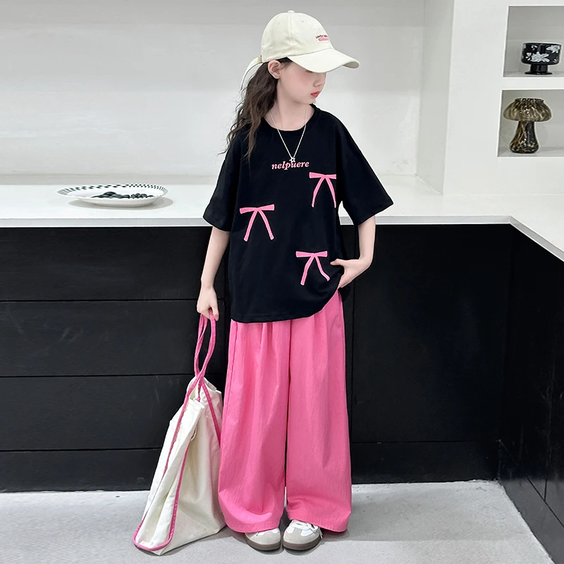 Venda quente crianças verão superior e inferior 2 peças conjunto de roupas com arco para meninas elegante algodão camiseta calças agasalho para crianças