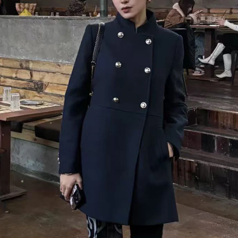 

Women's elegant double-breasted stand-collar wool coat with golden buttons, showcasing winter fashion style