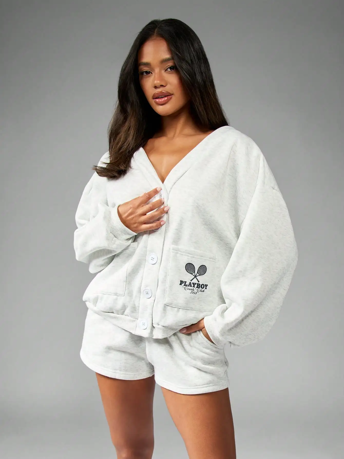 

Cozy V-Neck Button-Up Cardigan with Tennis Graphic Pocket, Loose Fit Knitwear for Fall Winter