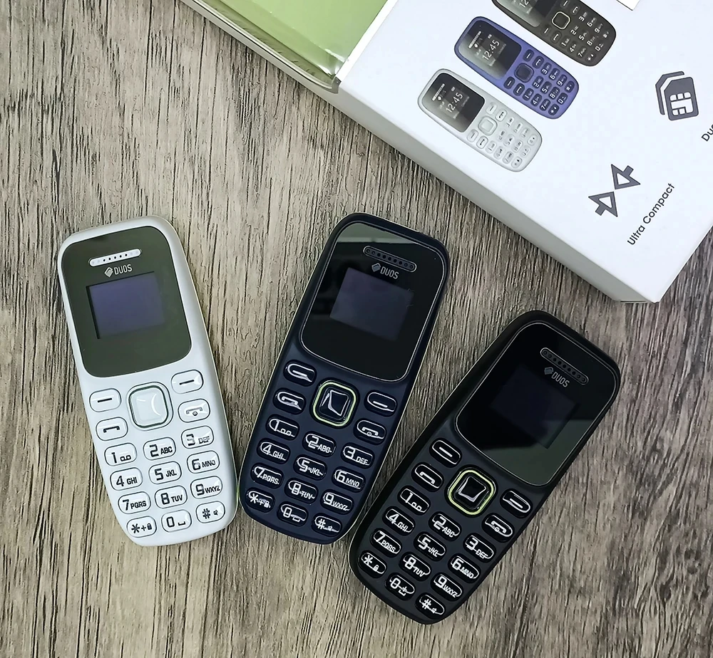 SERVO Mini Mobile Phone 2G GSM Dual SIM Standby Bluetooth Dial Magic Voice Call Recording Smallest Button Cellphones Three Color