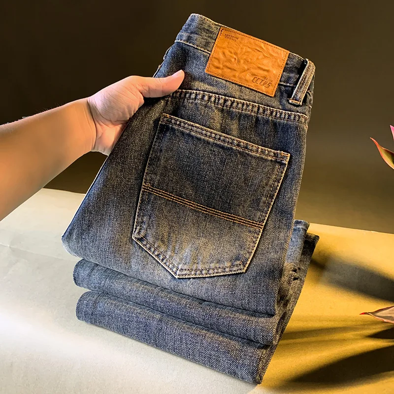 Vaqueros de mezclilla lavados retro de alta gama para hombres en otoño de 2025, nueva ropa para hombres versión coreana pantalones sueltos y suaves de tubo recto