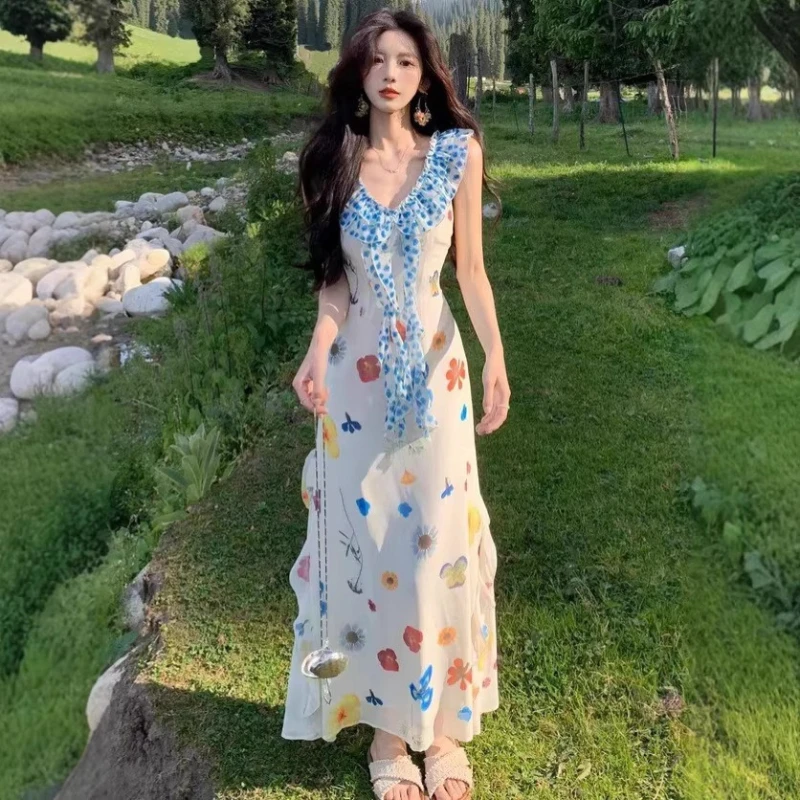 French Style Elegant V-neck Floral Suspender Dress for Women Summer 2026 New Fashionable Vacation Style Temperament Long Skirt