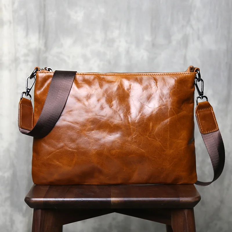 حقيبة كروس كلاسيكية من الجلد المشمع والحبوب العلوية 2025 تصميم جديد بسيط للجنسين محفظة بمقبض ذات سعة كبيرة #2