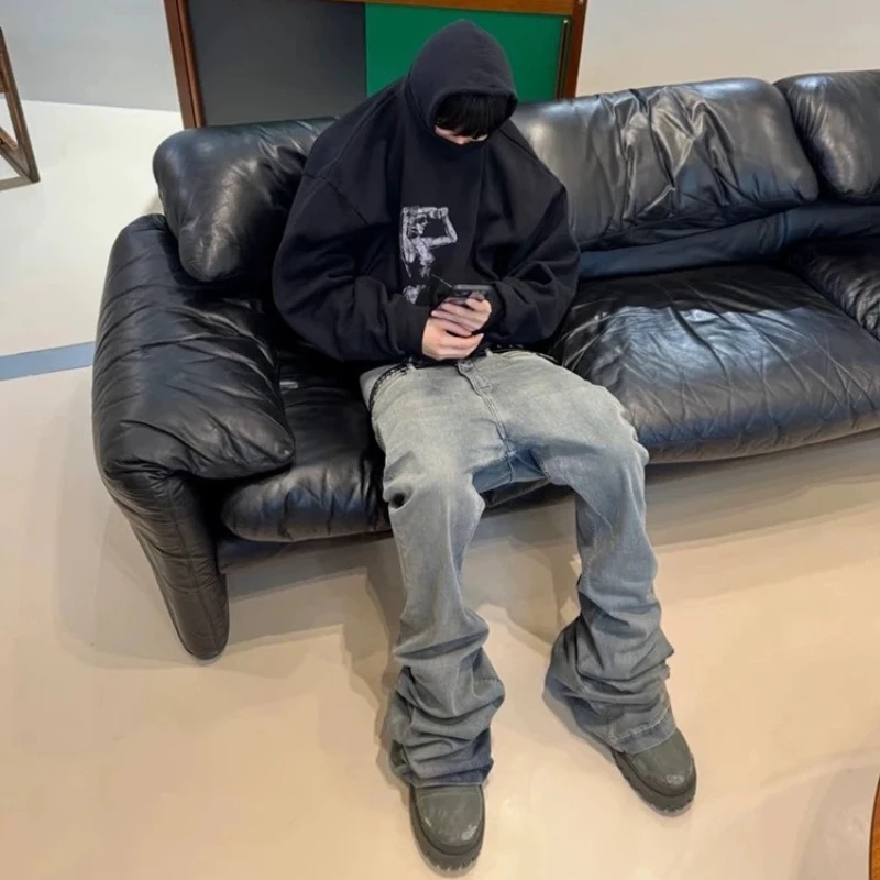 

Rick Ro distressed blue washed wide-leg slim-fit flared pants with floor-length hem and distressed hems - Bolan denim pants