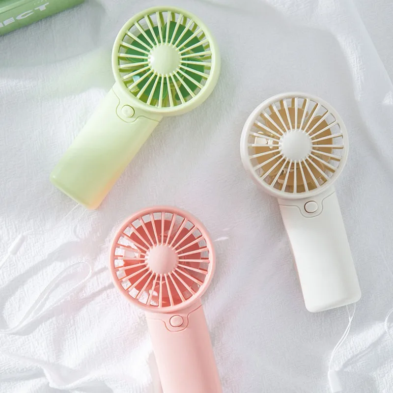 Multi-Color Compact Handheld Fan with Quiet Operation Portable Design and One-Touch Control for Home Office and Travel Available