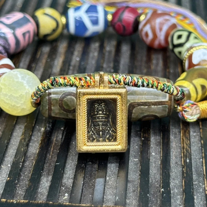 

Tibetan-style agate nine-eye dzi bead bracelet with Zhakiram God of Wealth Gau box accessory, hand-woven,