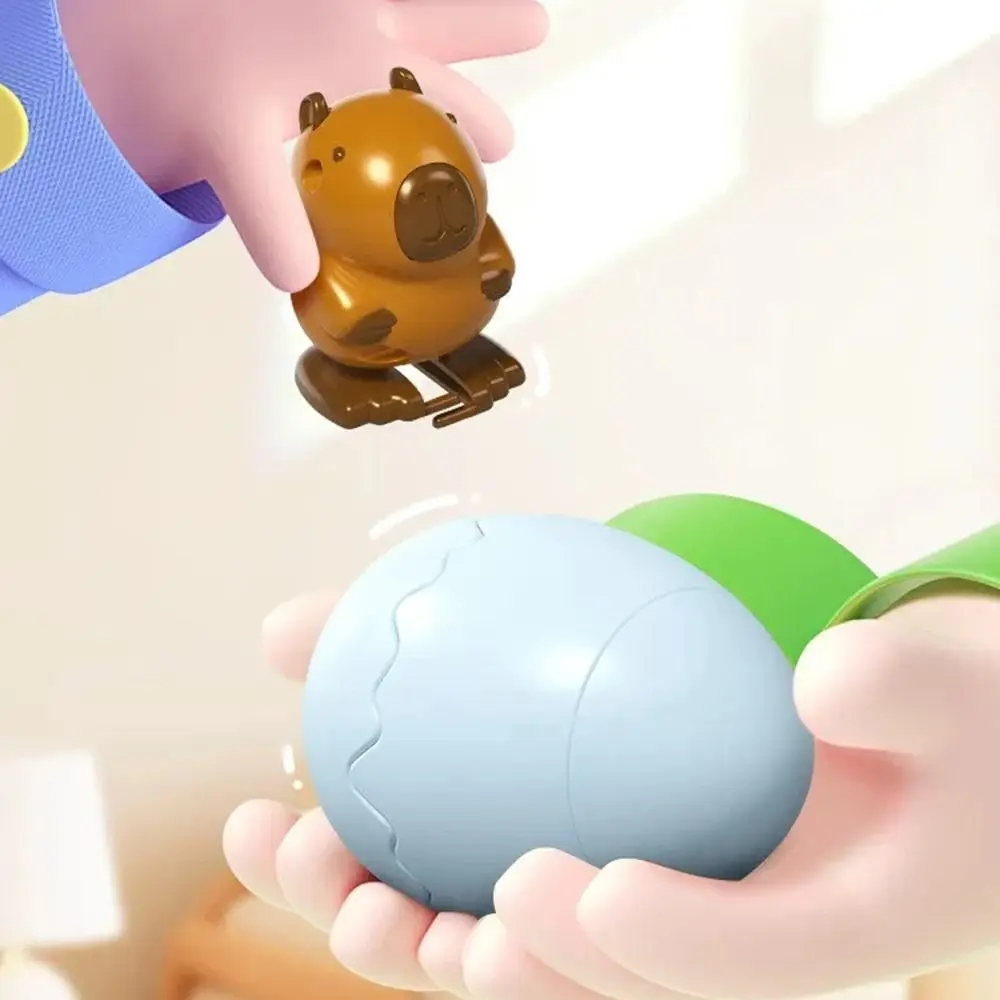 

Креативный подарок: яйцо-карапура с заводным механизмом, шагающее, мультяшное, пластиковое, для детей, на день рождения