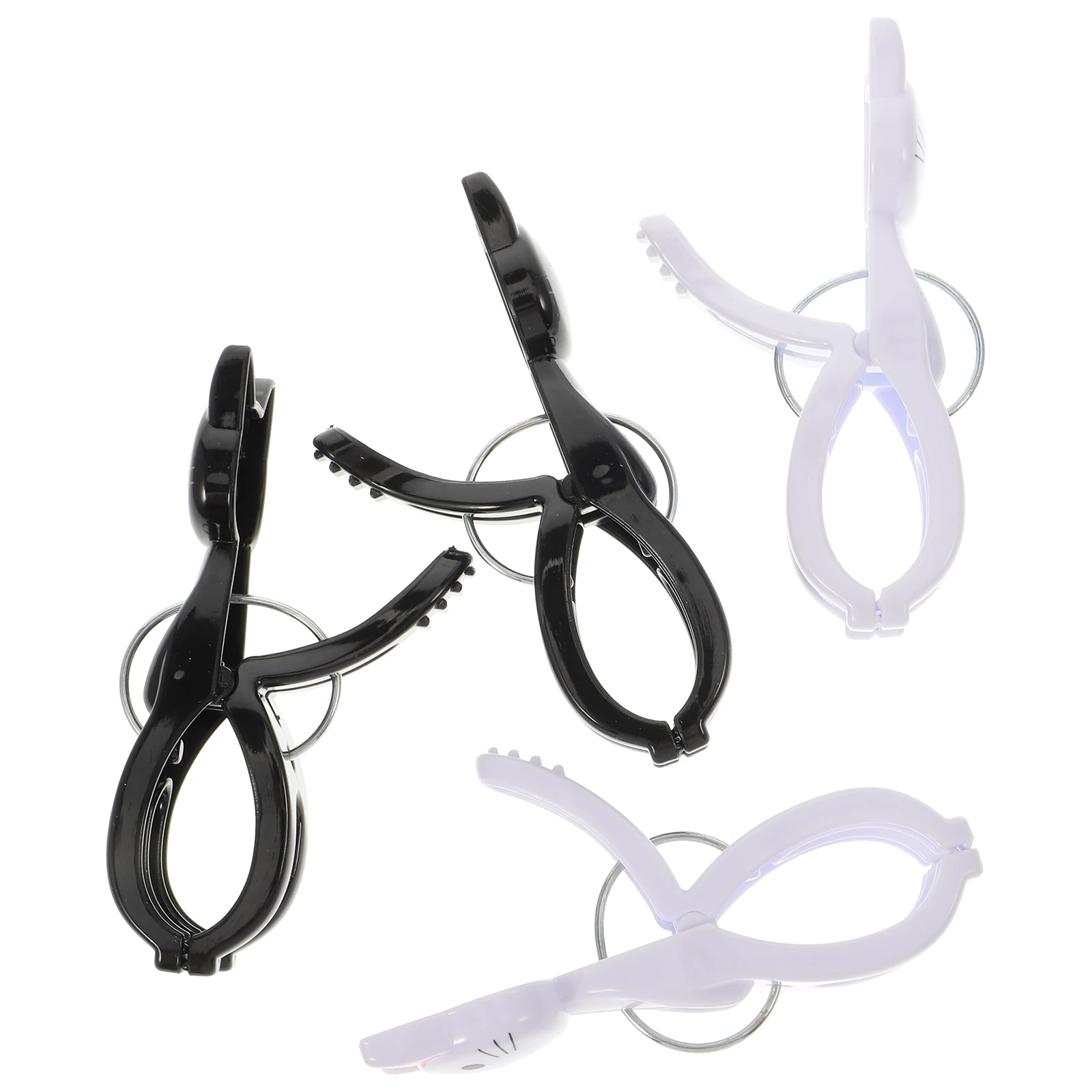 

4pcs Beach Chair Clips for Towels Non Slip Windproof Plastic Clothespins Black2White2 Small Clamps Outdoor Use