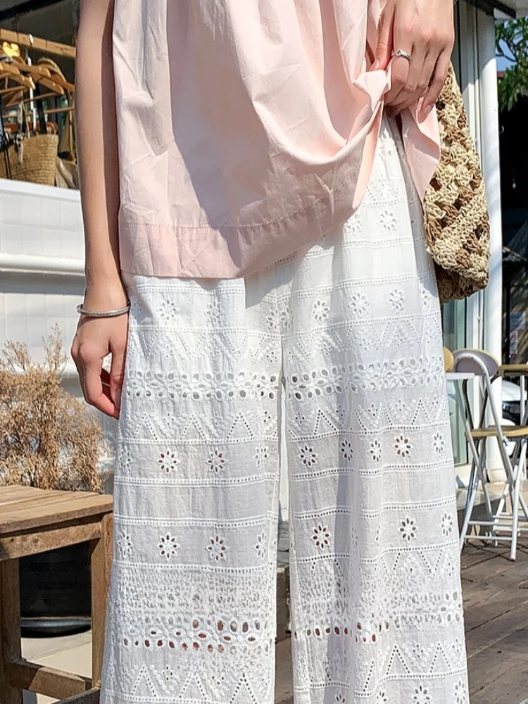 Białe koronkowe ażurowe spodnie z szerokimi nogawkami damskie luźne letnie cienkie spodnie plażowe na wakacje proste spodnie typu tuba casualowe spodnie
