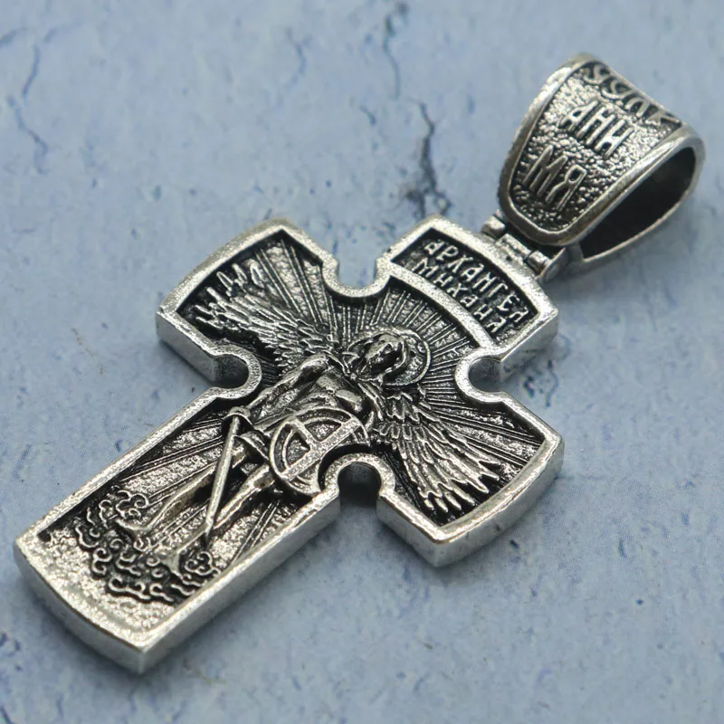 

Buy 4 Get 1 Free 52x26mm 11g This double-sided cross is a testament to divine protection cast in metal Silver Pendant