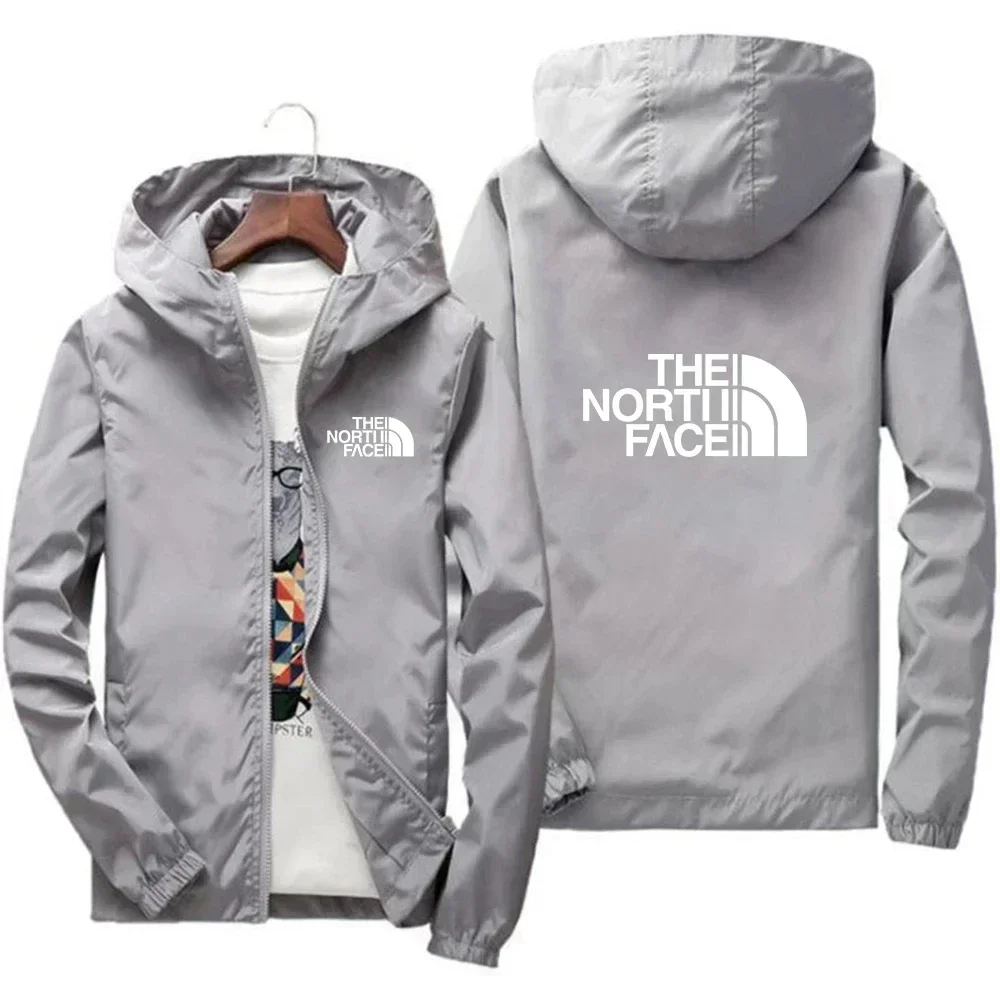 2025 Nueva chaqueta de moda para hombres europeos y americanos, abrigo con capucha con cremallera impermeable y resistente al viento, primavera e invierno al aire libre