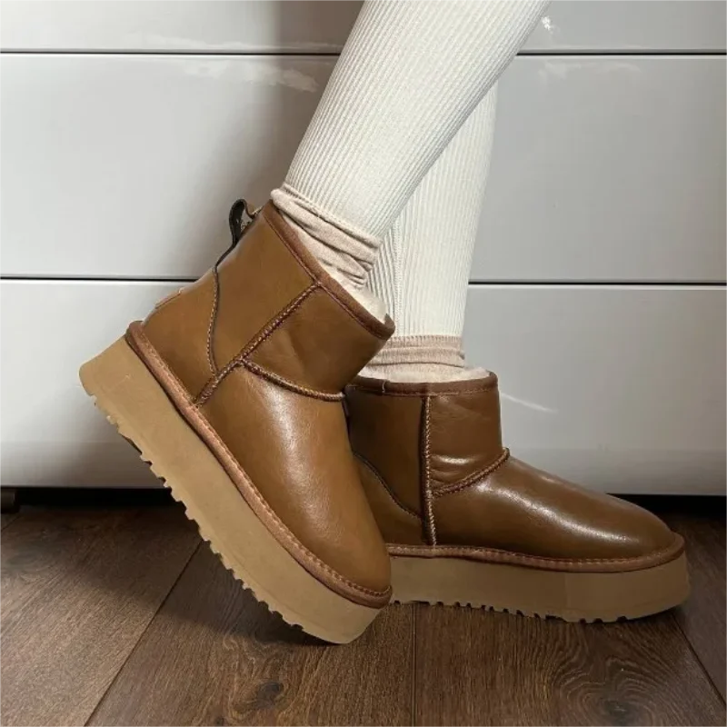 Botas de nieve de lana auténtica para mujer, clásicas australianas, impermeables, resistentes a las manchas y al aceite, cuero cálido, novedad de 2023