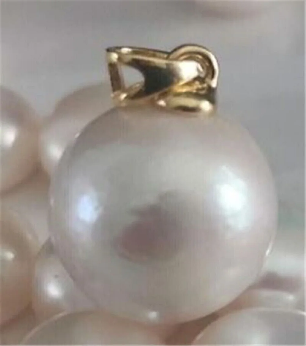 

Giant 13-14mm Natural White South Sea Pearl Pendant Necklace in 14K Gold