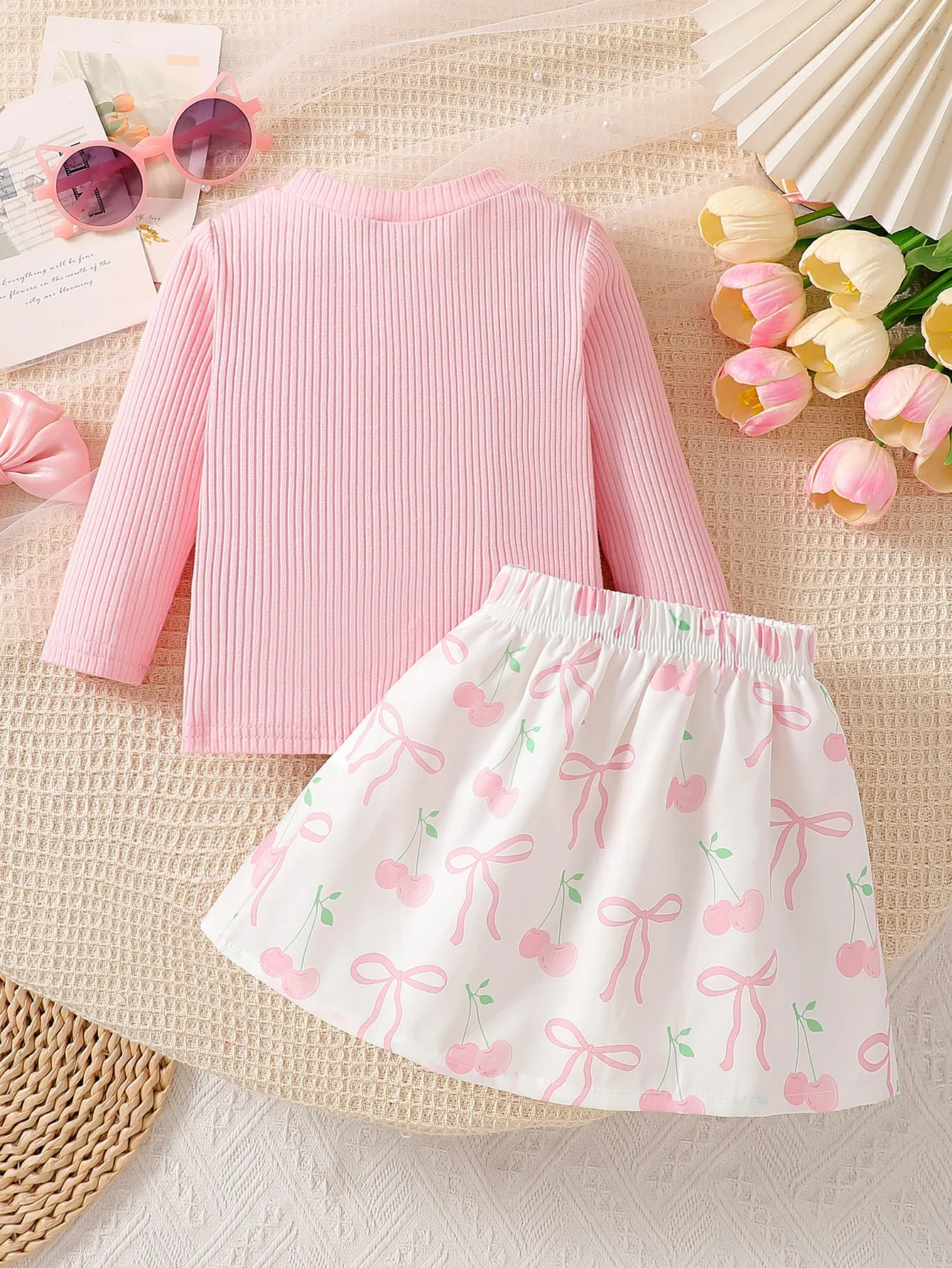 Baby girl pink round neck mesh patchwork cherry pattern embroidered long sleeved top paired with white bow printed short skirt t