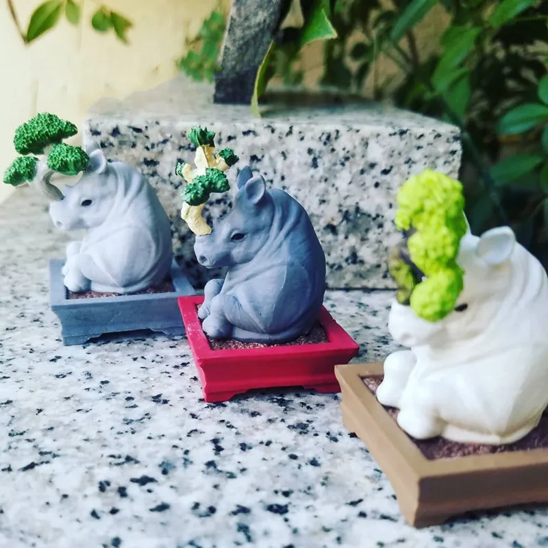 Cápsula Q versión planta lindo rinoceronte en maceta Animal creativo Bonsai escritorio pequeño adorno producto terminado figura Juguetes