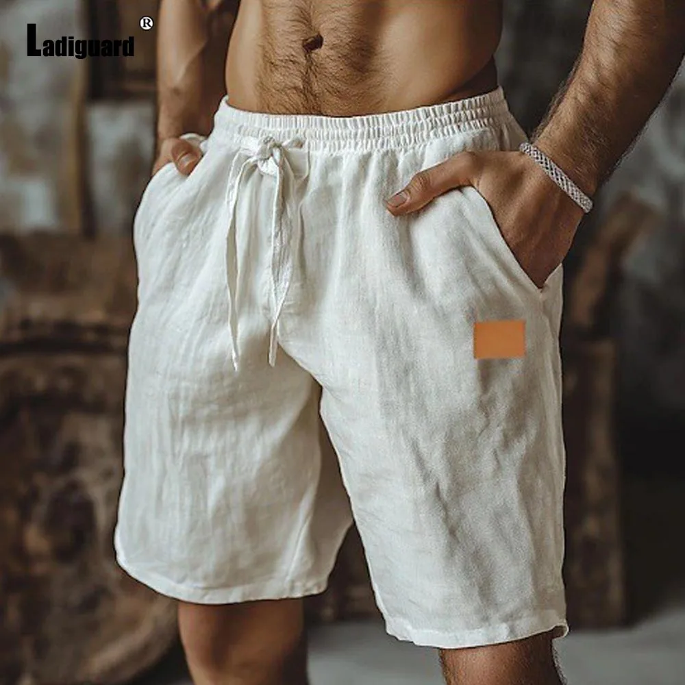 

2025 Мужские повседневные хлопковые шорты с карманами-стойкой, большие размеры 3xl, мужские прямые полубрюки, новые летние пляжные шорты с эластичной резинкой на талии