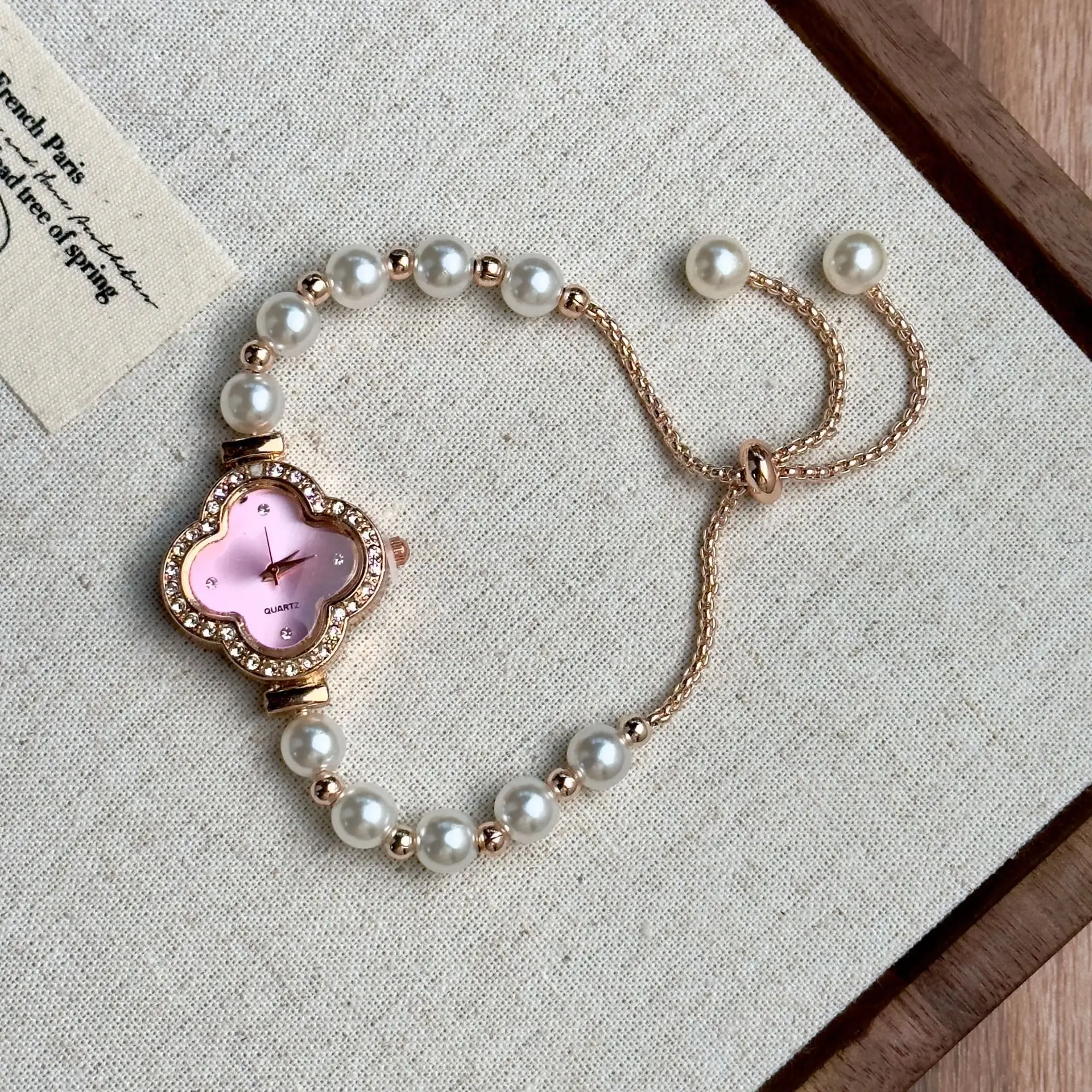

25 New popular four-leaf clover high-value fashion student watch women's watch pearl bracelet watch