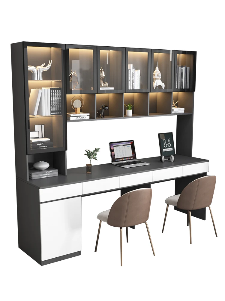 

A modern and minimalist computer desk and bookshelf combination, with a desk against the wall, for home use and student study