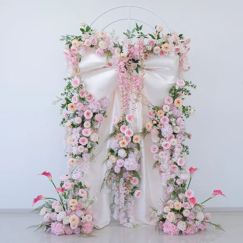 Fantasy pink and white simulated flower arch, wedding bow ceremony set, decorative flower clock in shopping mall