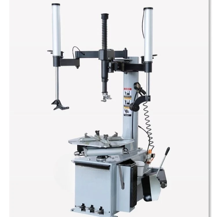 Машина для разборки и сборки автомобиля. Машина для снятия шин с двойным вспомогательным рычагом влево и вправо.