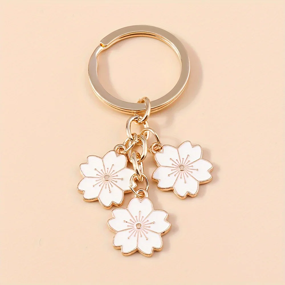 Llavero Chic con Diseño de Flor de Cerezo Sakura - Elegante Colgante de Flor de Aleación de Zinc para Bolsos y Llaves, Regalo Perfecto de San Valentín para Ella, Disponible en Varios Colores