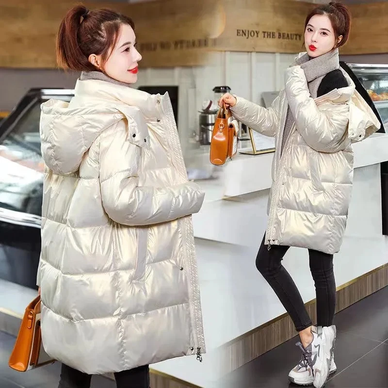 Daunen Baumwolle gepolsterte Jacke Mädchen lange lose Kapuze Mode westlichen Stil koreanischen Winter warm lange Baumwolle gepolsterte Jacke Mantel.