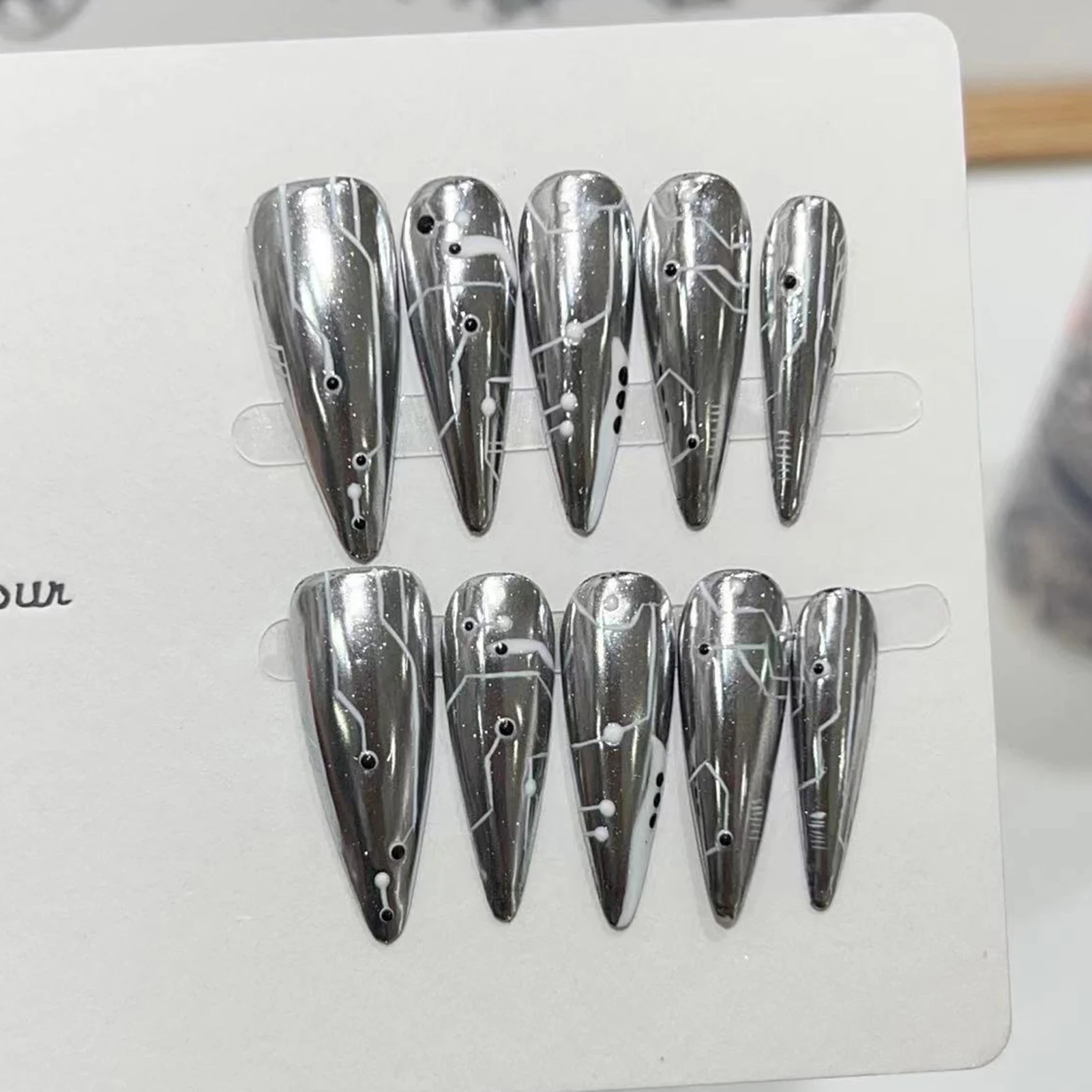 10 pçs halloween unhas falsas reutilizáveis ponta longa preto rachado olho de gato estilo punk prata longa imprensa em unhas para decoração feminina