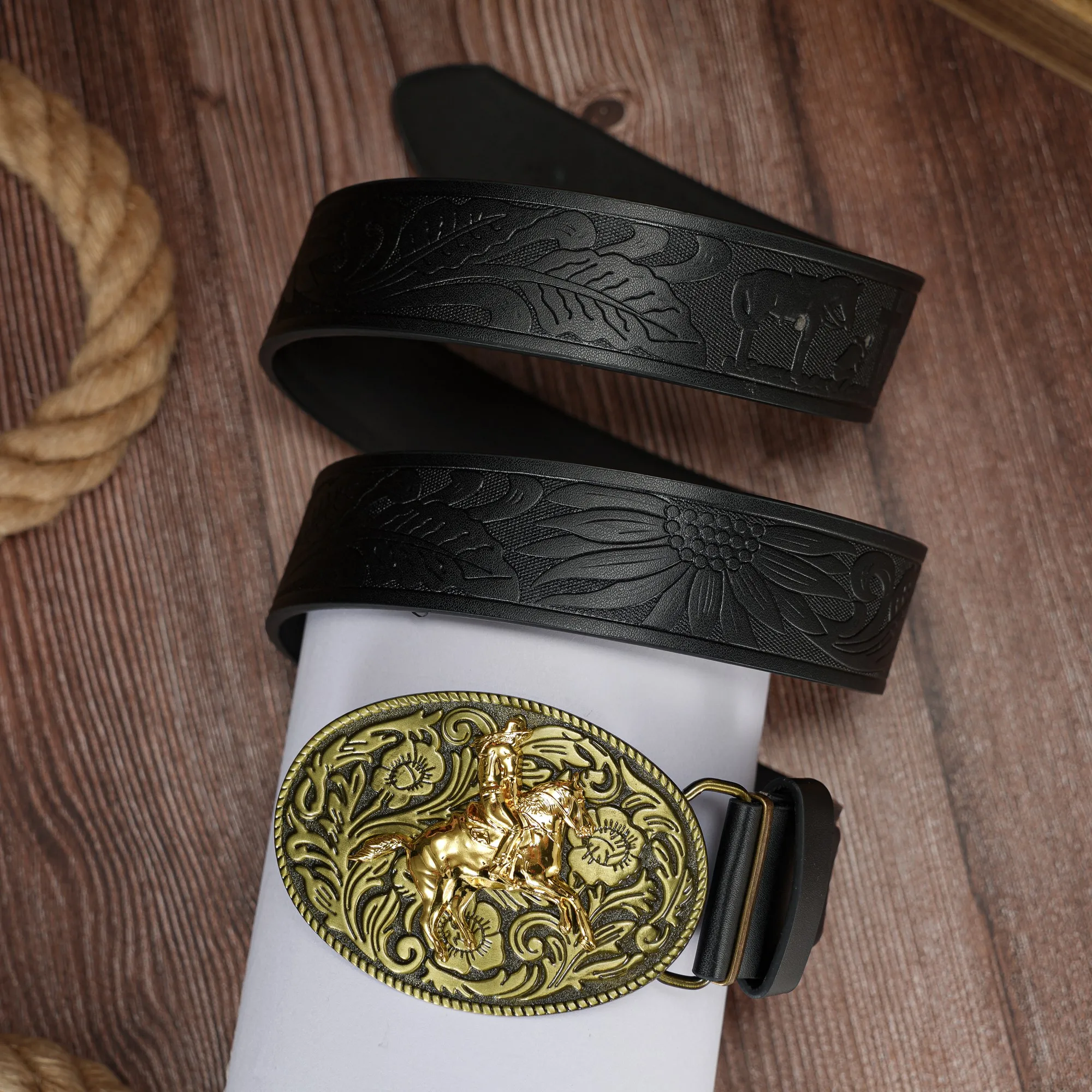This retro and unique PU embossed belt with a bull's head and rider pattern bottom buckle is suitable for both men and women