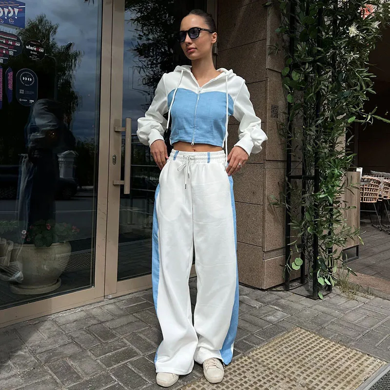 ชุดกางเกงสไตล์สตรีทฤดูใบไม้ผลิ/ฤดูร้อนที่ทันสมัยและสะดวกสบาย เสื้อฮู้ดยีนส์และกางเกงขายาวแบบประกบ