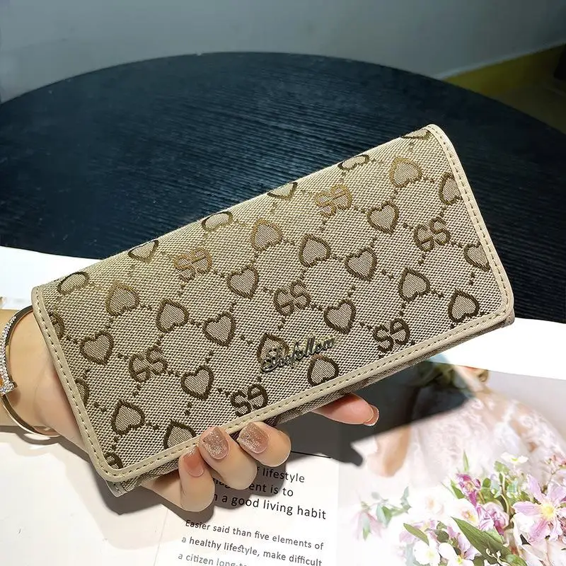 nouveau-portefeuille-long-en-cuir-pour-femme-hong-kong-west-2026-–-multi-cartes-tendance-fin-avec-clip-Elegant-pratique-et-fonctionnel