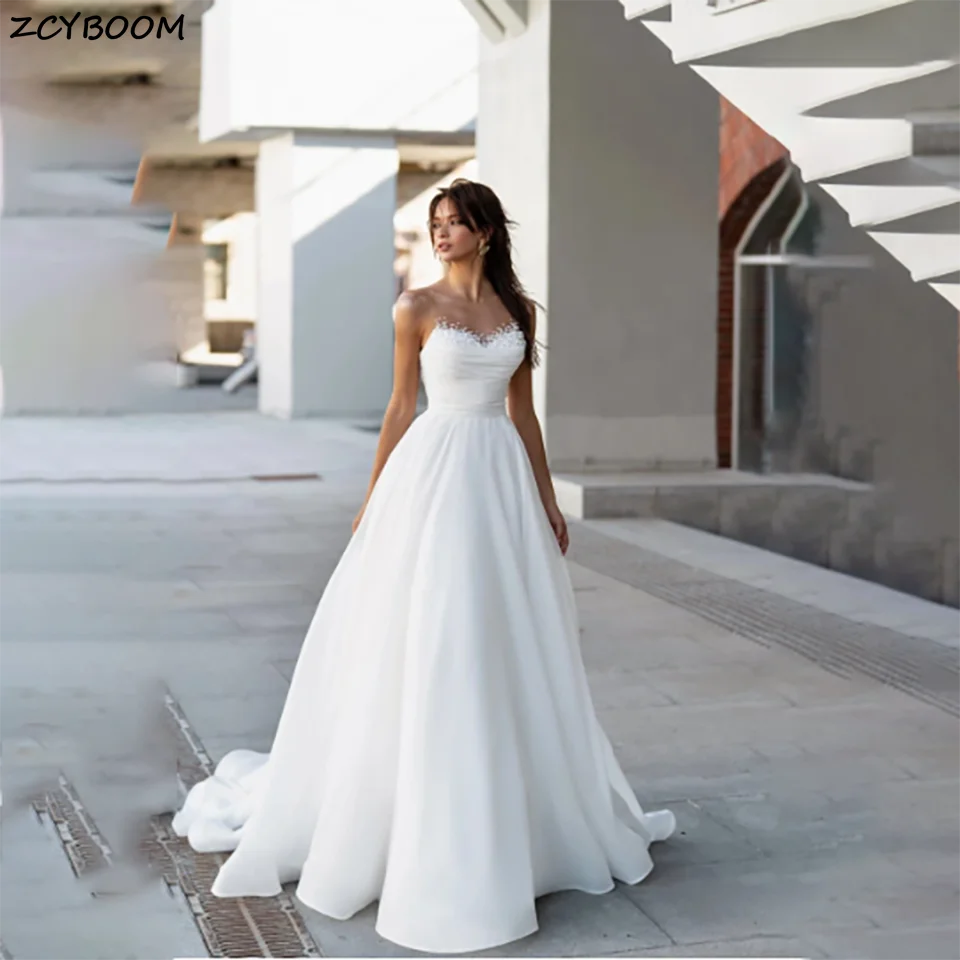 

Customized New Charming Sweetheart Pearls Strapless Lace Appliques A Line Wedding Dresses 2025 Open Back Court Train Bridal Gown