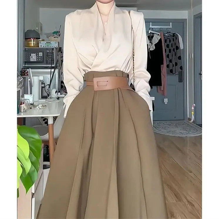 

Women's skirt suit women's spring new casual temperament Joker shirt women's high waist A-shaped skirt two-piece suit