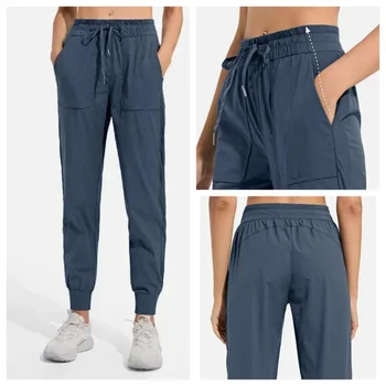 女性用ミディアムウエストスポーツパンツ,ポケット付きルーズフィット,通気性,ヨガ用